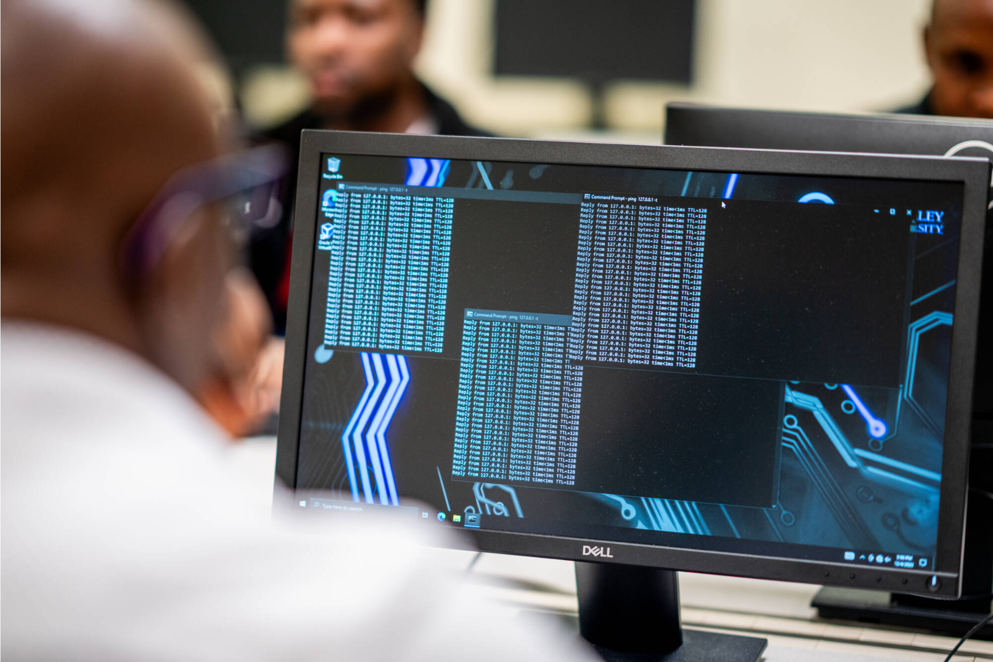 Students from Professor Samah Mansour's computing class work in the Cyber Threat Range, December 4, 2023.